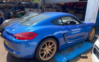 Blue Porsche 981 in for full service brake fluid change and transmission oil change