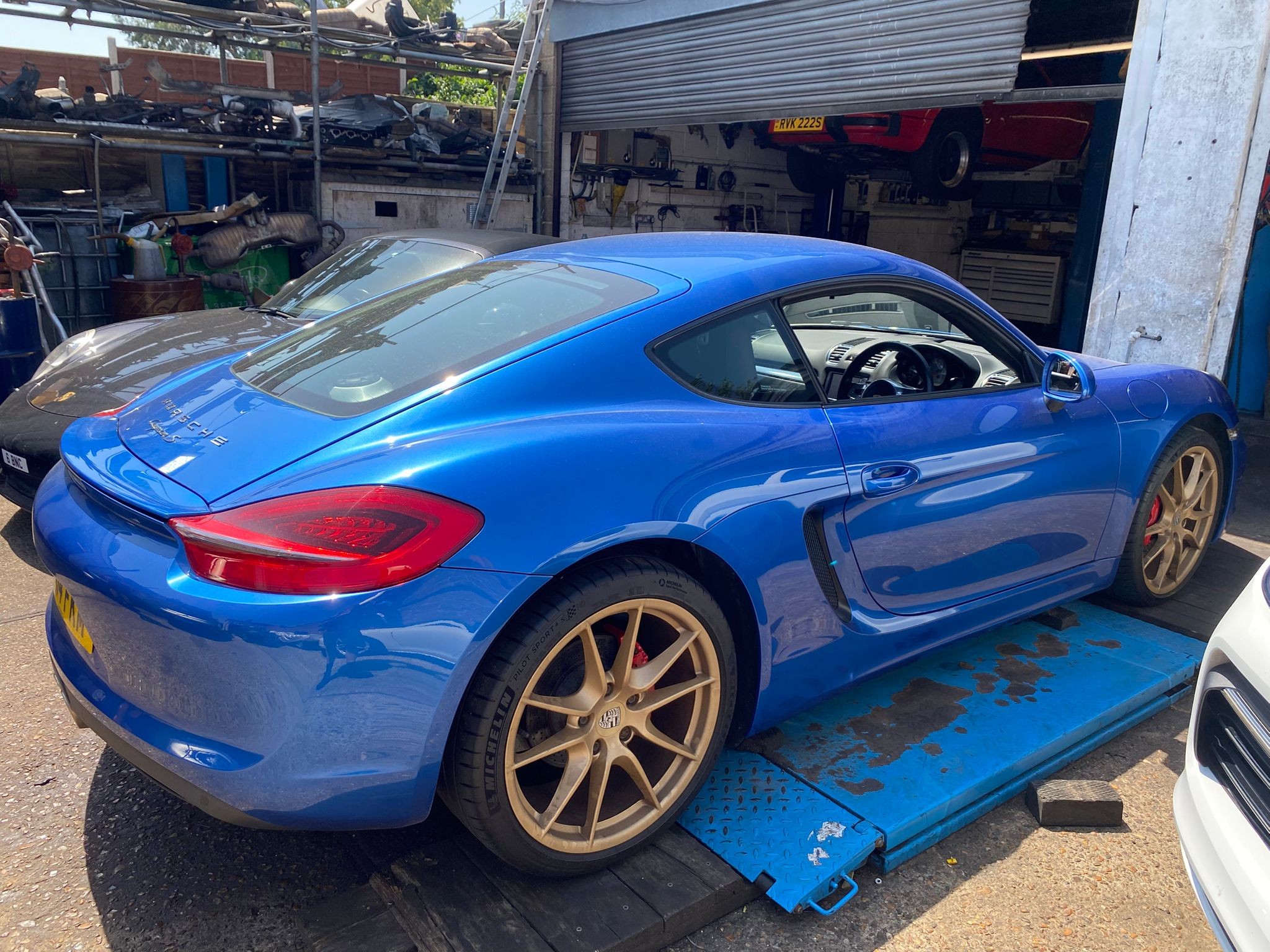 Blue Porsche 981 in for full service brake fluid change and transmission oil change
