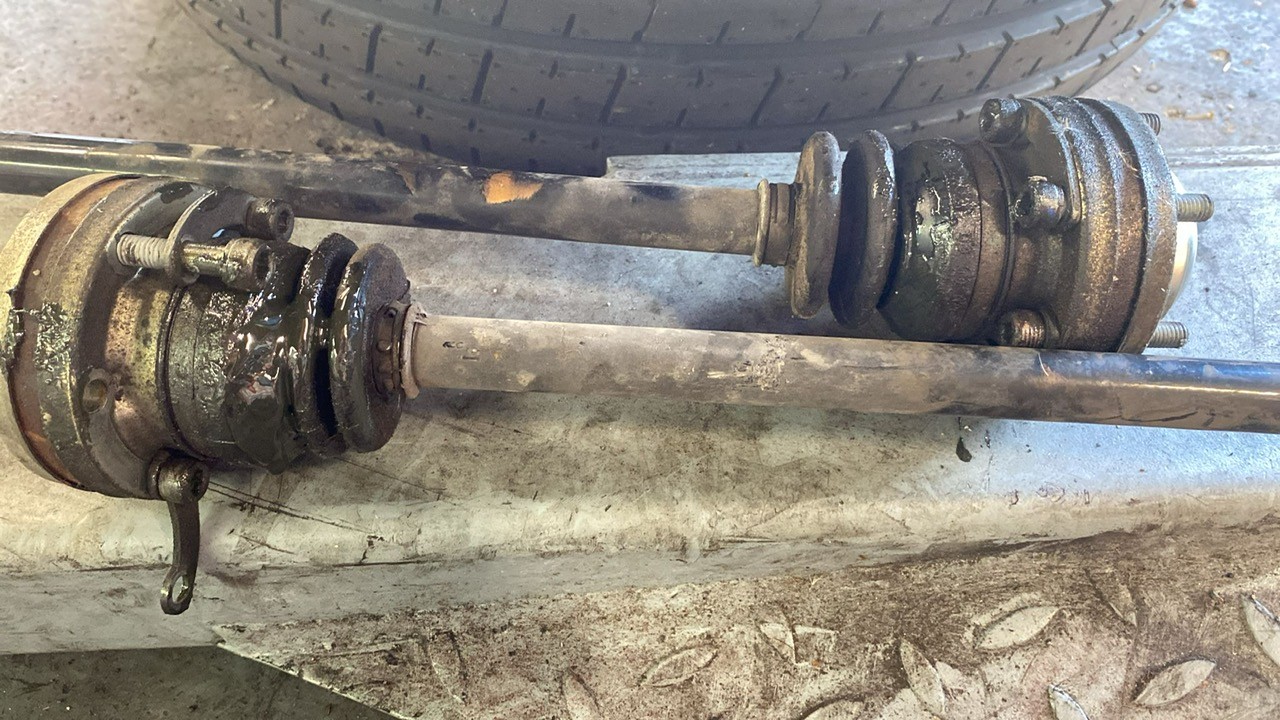 Porsche 911 4S in the workshop for front driveshaft boot repair